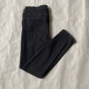 Current/Elliott Stretch black denim. Ripped knees. Size 30.